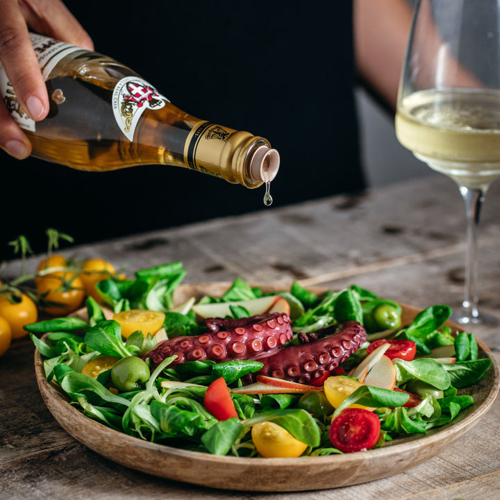 Octopus salad with fresh vegetables and White Condiment