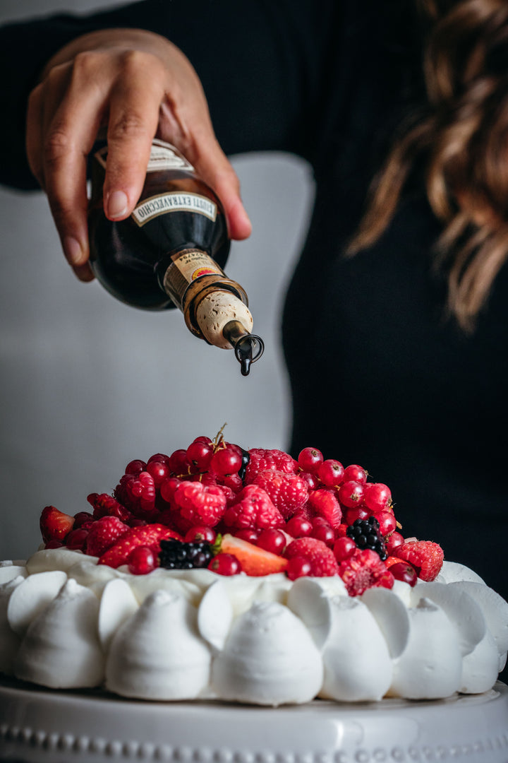Pavlova with mixed berries and rosewater
